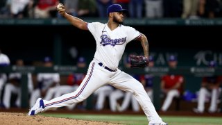 ARLINGTON, TEXAS – AUGUST 15: Jonathan Hernandez #72 of the Texas Rangers pitches against the Oakland Athletics in the top of the ninth inning at Globe Life Field on August 15, 2022 in Arlington, Texas. (Photo by Tom Pennington/Getty Images)