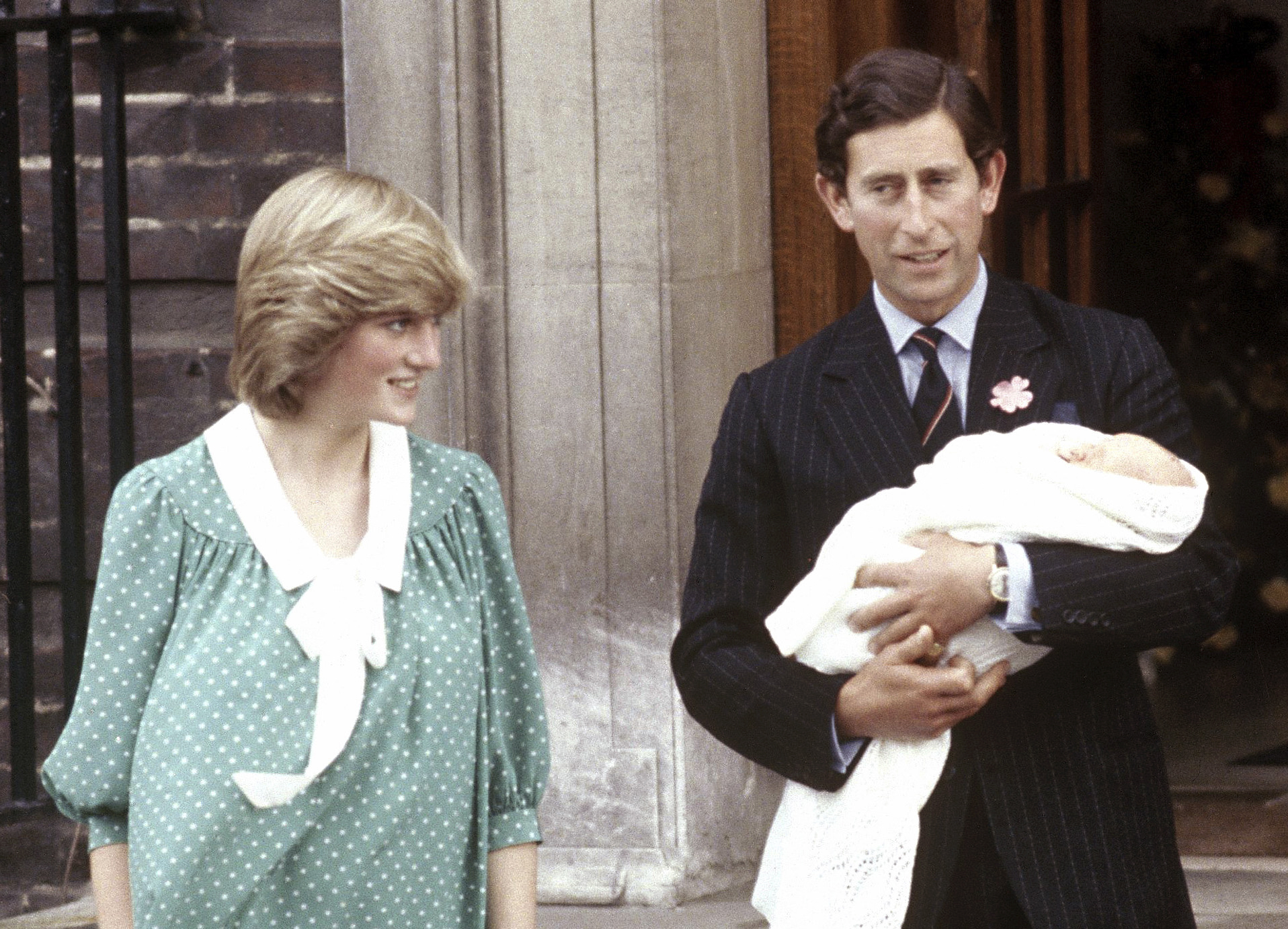 In this file photo dated June 22, 1982, Prince Charles the Prince of Wales, with his wife Princess Diana, holds his newborn son Prince William as they leave The Lindo Wing of St. Mary’s Hospital, in Paddington, London.