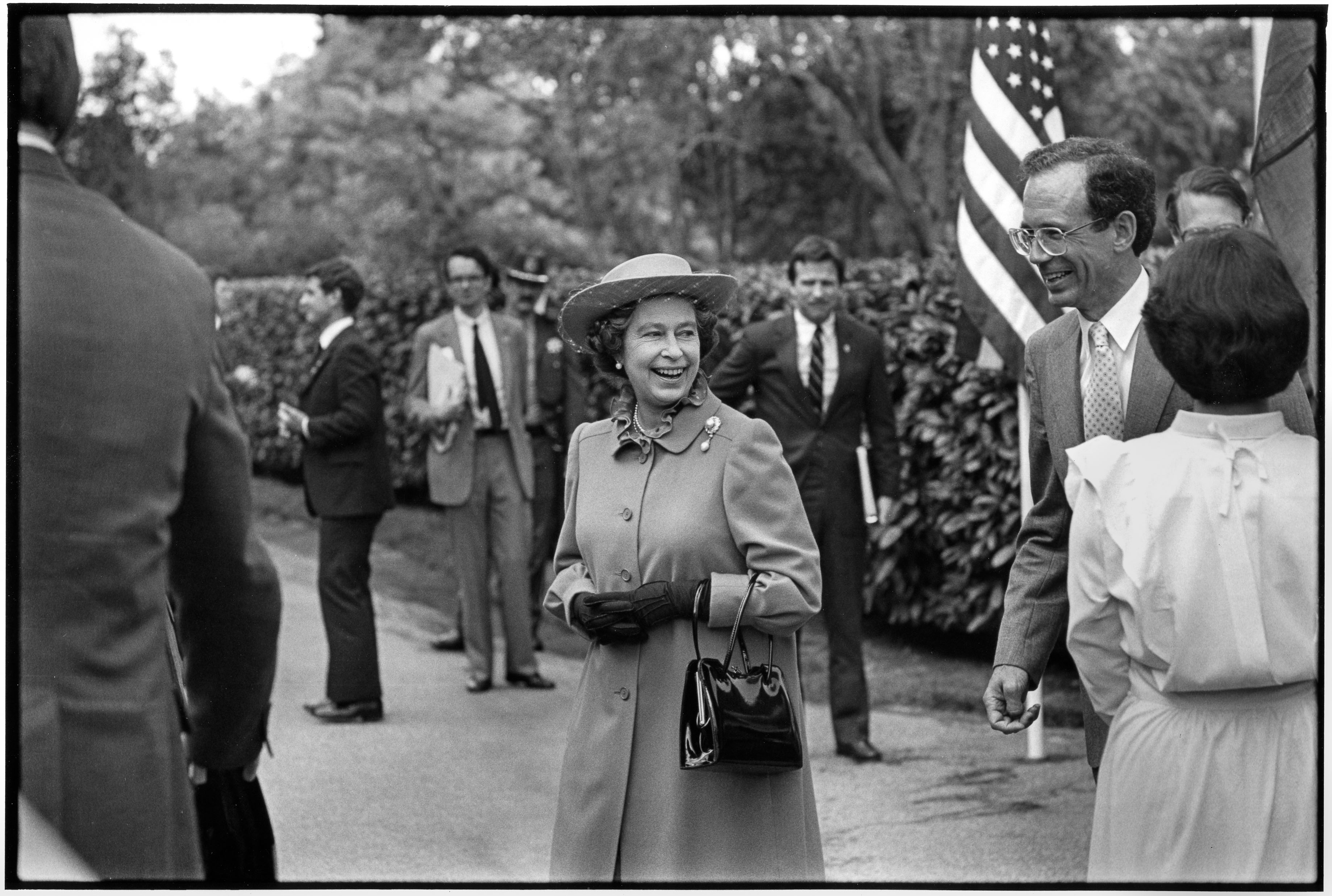 Queen Elizabeth II departs Hoover House following lunch at Stanford University during her West Coast tour of the United States accompanied by Prince Philip on March 3, 1983 in Palo Alto, California.