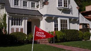 An ‘open house’ flag is displayed outside a single family home on September 22, 2022 in Los Angeles, California.