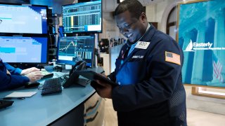 Traders work on the floor of the New York Stock Exchange (NYSE) on October 27, 2022 in New York City. Stocks continued their upward gains Thursday with the Dow rising nearly 400 points following a new GDP report that beat expectations.