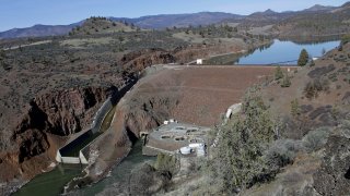 The Iron Gate Dam, powerhouse and spillway is seen on the lower Klamath River near Hornbrook, Calif, on March 3, 2020. The largest dam demolition and river restoration plan in the world could be close to reality Thursday, Nov. 17, 2022, as U.S. regulators vote on a plan to remove four aging hydro-electric structures, reopening hundreds of miles of California river habitat to imperiled salmon.