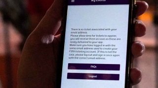 A Wales fan shows an error with their match ticket on the Hayya Qatar 2022 app ahead of the FIFA World Cup Group B match at the Ahmad Bin Ali Stadium, Al-Rayyan, Qatar.