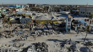 Remains of destroyed restaurants, shops and other businesses are seen almost one month after Hurricane Ian landfall in Fort Myers Beach, Florida, U.S., October 26, 2022. REUTERS/Marco Bello