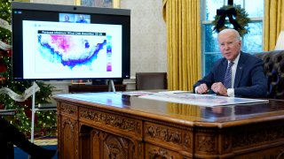 President Joe Biden participates in a briefing on winter storms across the United States in the Oval Office of the White House, Thursday, Dec. 22, 2022, in Washington.