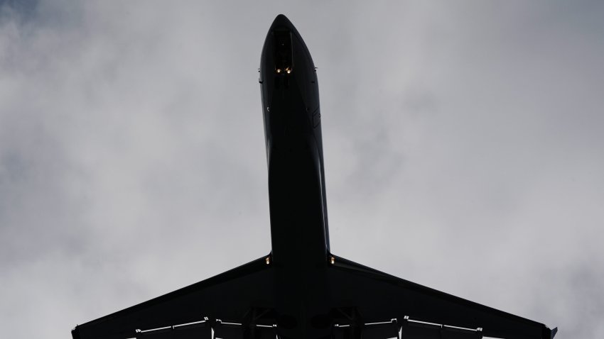 A generic shot of a plane in flight at San Diego International Airport in 2020