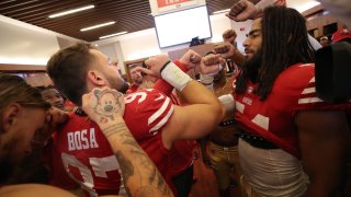 Nick Bosa #97 and Fred Warner #54 of the San Francisco 49ers.