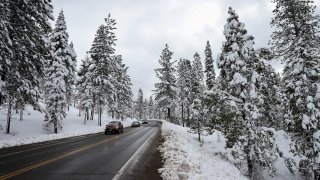 Highway 50 is seen as snowfall hits Lake Tahoe.