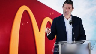 Former McDonald’s CEO Stephen Easterbrook unveiling the company’s new corporate headquarters during a grand opening ceremony on June 4, 2018, in Chicago