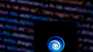 In this photo illustration, the Ubisoft video game company logo seen displayed on a smartphone.