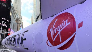 Virgin Orbit’s LauncherOne rocket on display in Times Square, New York.