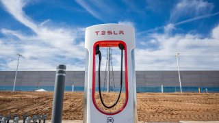 A charging station is seen at the Tesla Corporate Headquarters on January 03, 2023 in Travis County, Texas.