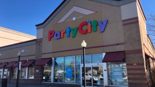 A shopper exits a Party City Holdco Inc. store in New York, U.S., on Wednesday, Nov. 7, 2018.