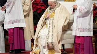 Pope Francis holds a Mass for the solemnity of St. Mary at the beginning of the new year, in St. Peter’s Basilica at the Vatican, Sunday, Jan. 1, 2023. Pope Emeritus Benedict XVI, the German theologian who will be remembered as the first pope in 600 years to resign, has died, the Vatican announced Saturday. He was 95. (AP Photo/Andrew Medichini)