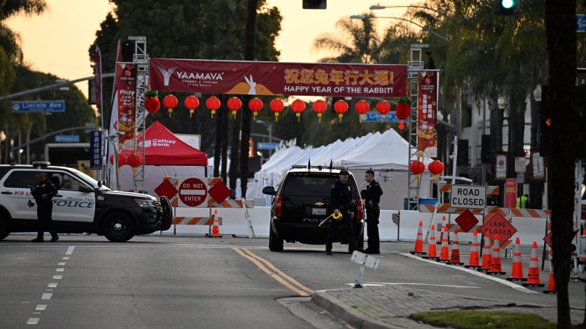 TOPSHOT – Police work near the scene of a mass shooting in Monterey Park, California, on January 22, 2023. – Ten people have died and at least 10 others have been wounded in a mass shooting in a largely Asian city in southern California, police said, with the suspect still at large hours later. (Photo by Robyn BECK / AFP) (Photo by ROBYN BECK/AFP via Getty Images)