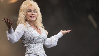 Dolly Parton performs on the Pyramid Stage during Day 3 of the Glastonbury Festival at Worthy Farm on June 29, 2014 in Glastonbury, England.