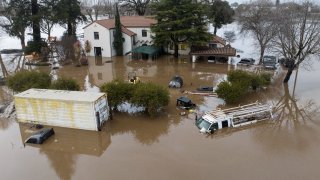 Flooded home partially underwater in Gilroy.