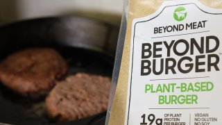Patties of Beyond Meat Inc.’s plant-based burger Beyond Burger are cooked on a skillet.