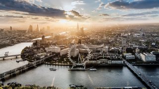 A London cityscape, with the River Thames, the London Eye, and the capital’s financial district, known as “the City.”