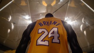 A jersey that belonged to late basketball star Kobe Bryant, expected to fetch between 5-7 million USD, is displayed at Sotheby’s auction house in New York on February 1, 2023.