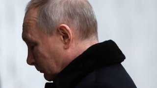 Russian President Vladimir Putin attends a wreath-laying ceremony while visiting the Mamayev Kurgan, a memorial complex commemorating the heroes of the Battle of Stalingrad on Feb. 2, 2023, in Volgograd, Russia.