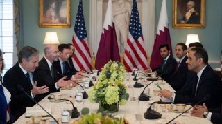 Secretary of State Antony Blinken (L) meets with Qatari Deputy Prime Minister and Foreign Minister Mohammed bin Abdulrahman Al-Thani
