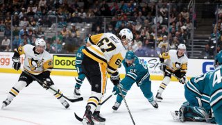 SAN JOSE, CALIFORNIA – FEBRUARY 14: Rickard Rakell #67 of the Pittsburgh Penguins scores a goal against the San Jose Sharks in the first period at SAP Center on February 14, 2023 in San Jose, California. (Photo by Ezra Shaw/Getty Images)