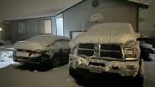 Cars covered in snow in Hidden Valley. (Feb. 24, 2023)