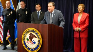 Jeffrey Abrams, Regional Director of Anti-Defamation League, (at podium) denounces anti-Semitism and hate crimes at a news conference at the U.S. Attorney's Office Central District of California offices in Los Angeles, Feb. 17, 2023. From left, United States Attorney Martin Estrada and Los Angeles Mayor Karen Bass.