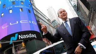 Lucid Motors CEO Peter Rawlinson poses at the Nasdaq MarketSite as Lucid Motors (Nasdaq: LCID) begins trading on the Nasdaq stock exchange after completing its business combination with Churchill Capital Corp IV in New York City, New York, July 26, 2021.