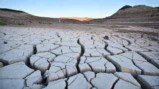 A dry cracked lake bed in drought-stricken Lake Mead on September 15, 2022 in Boulder City, Nevada. – Located outside of Las Vegas near the