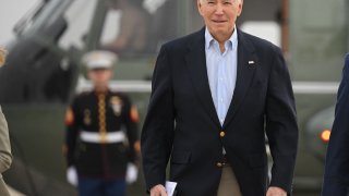 US President Joe Biden makes his way to board Air Force One before departing from Joint Base Andrews in Maryland on March 31, 2023.