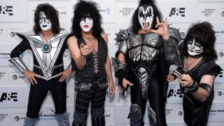 Members of the band Kiss, from left, Tommy Thayer, Paul Stanley, Gene Simmons and Eric Singer attend the premiere of A&E Network's "Biography: KISStory" in New York, June 11, 2021.