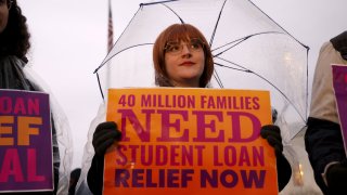 WASHINGTON, DC – FEBRUARY 27: Student loan borrowers gather at Supreme Court the evening before the court hears two cases on student loan relief to state the relief is legal and needs to happen immediately on February 27, 2023 in Washington, DC. (Photo by Jemal Countess/Getty Images for We The 45 Million)