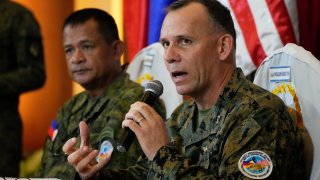 U.S. Marine Corps MGEN Eric Austin, U.S. Exercise Director Representative, right, speaks, sitting beside Philippine Army MGEN Marvin Licudin, Philippine Exercise Director, during a news conference at the opening ceremonies of a joint military exercise flag called “Balikatan,” a Tagalog word for “shoulder-to-shoulder,” at Camp Aguinaldo military headquarters Tuesday.