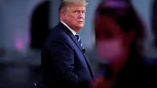 U.S. President Donald Trump looks on during a commercial break during a live one-hour NBC News town hall forum with a group of Florida voters in Miami, Florida, U.S., October 15, 2020.