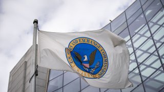 A flag outside the U.S. Securities and Exchange Commission headquarters in Washington, Feb. 23, 2022.