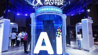 Visitors stop by the pavilion of iFLYTEK at the 2021 Global Artificial Intelligence Technology Conference (GAITC2021) in Hangzhou in east China’s Zhejiang province Sunday, June 06, 2021.