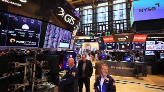 Traders work on the floor of the New York Stock Exchange on April 26, 2023 in New York City.