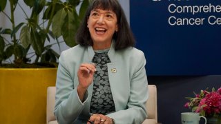 Dr. Monica Bertagnolli speaks during a visit from first lady Jill Biden to the University of California San Francisco Helen Diller Family Comprehensive Cancer Center in San Francisco, Oct. 7, 2022.