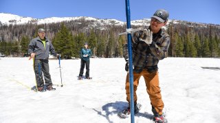 Final snow survey of the 2023 season at Phillips Station in the Sierra Nevada Mountains.