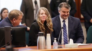 Lori Vallow Daybell talks with her lawyers before the jury’s verdict is read at the Ada County Courthouse in Boise, Idaho on Friday May 12, 2023.