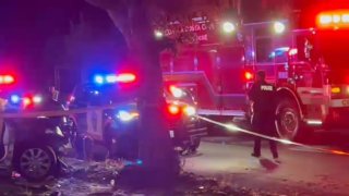 Authorities work at the scene of a deadly crash in Antioch.