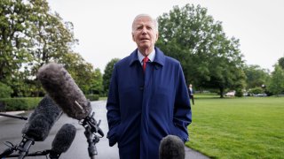 US President Joe Biden speaks to members of the media on the South Lawn of the White House before boarding Marine One in Washington, DC.