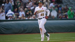 OAKLAND, CALIFORNIA – MAY 29: Ryan Noda #49 of the Oakland Athletics rounds the bases on his three-run home run in the fifth inning against the Atlanta Braves at RingCentral Coliseum on May 29, 2023 in Oakland, California. (Photo by Loren Elliott/Getty Images)