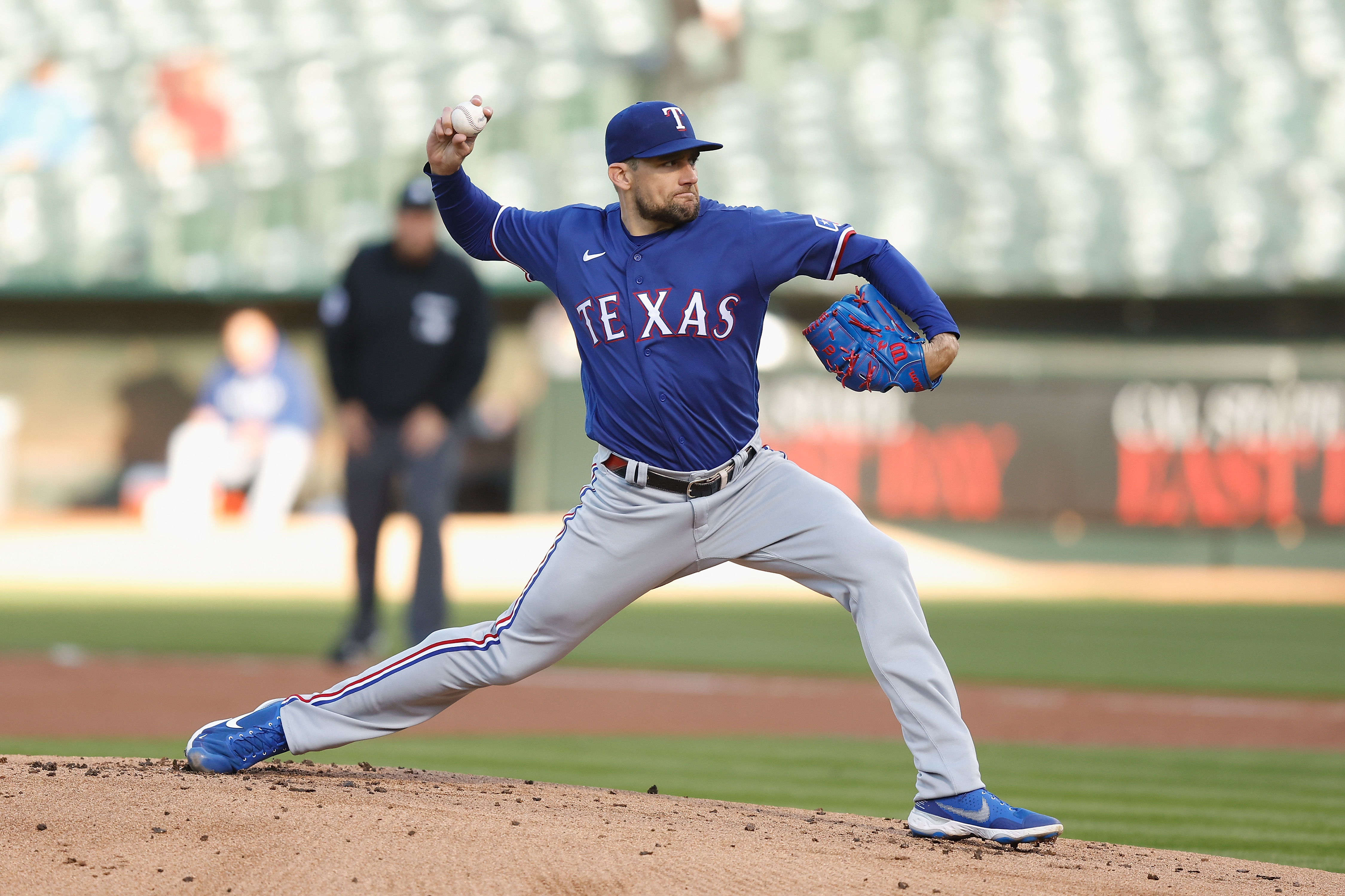 Nathan Eovaldi works around some trouble, picks up the win in Texas Rangers  debut