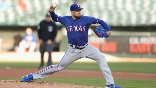 Nathan Eovaldi #17 of the Texas Rangers pitches in the bottom of the first inning against the Oakland Athletics at RingCentral Coliseum on May 11, 2023 in Oakland, California. (Photo by Lachlan Cunningham/Getty Images)