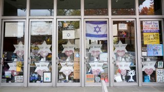 FILE - A memorial inside the locked doors of the Tree of Life synagogue in Pittsburgh's Squirrel Hill neighborhood on Oct. 26, 2022.