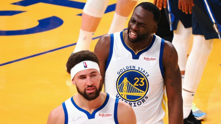 May 20, 2022; San Francisco, California, USA; Golden State Warriors guard Klay Thompson (11) and forward Draymond Green (23) react after Thompson is called for a foul against the Dallas Mavericks during the second quarter of game two of the 2022 western conference finals at Chase Center. Mandatory Credit: Kelley L Cox-USA TODAY Sports