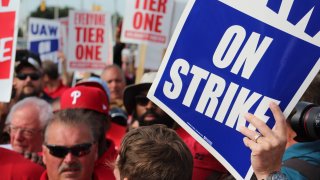United Auto Workers members on strike picket outside General Motors’ Detroit-Hamtramck Assembly plant on Sept. 25, 2019 with Vermont Sen. Bernie Sanders (far left) in Detroit.